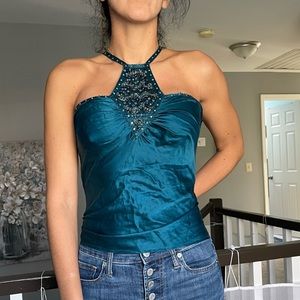 In new condition silk embroidered top